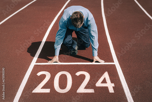 happy new year 2024. concept of starting business or career in the new year. businessman preparing for running. opening a business in 2024. transition to a new level concept
