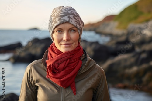 Portrait of a glad woman in her 40s wearing a protective neck gaiter against a peaceful tide pool background. AI Generation