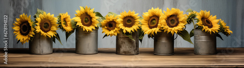 Sunflowers in galvanized cans against a rusty wall, 32:9 ratio, for wallpaper use
