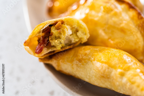 Breakfast Empanadas With Eggs and Sweet Potato © arinahabich