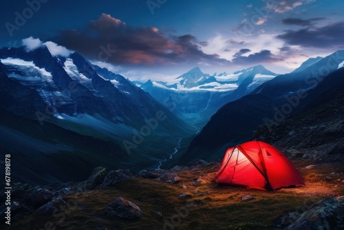 illuminated camping red tent on mountain at night