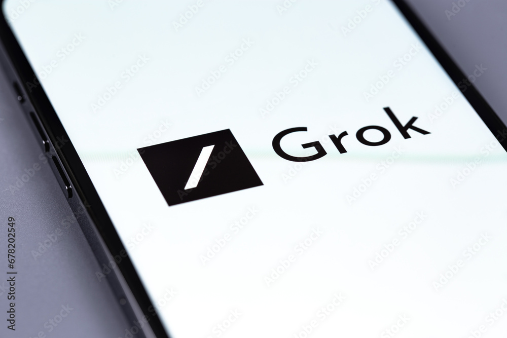 Grok xAI chatbot logo on a white screen smartphone. Grok (Grok xAI) is