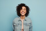 Portrait of a grinning woman in her 30s sporting a rugged denim jacket against a pastel or soft colors background. AI Generation