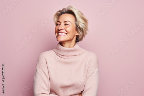 Portrait of a joyful woman in her 40s dressed in a warm wool sweater against a pastel or soft colors background. AI Generation