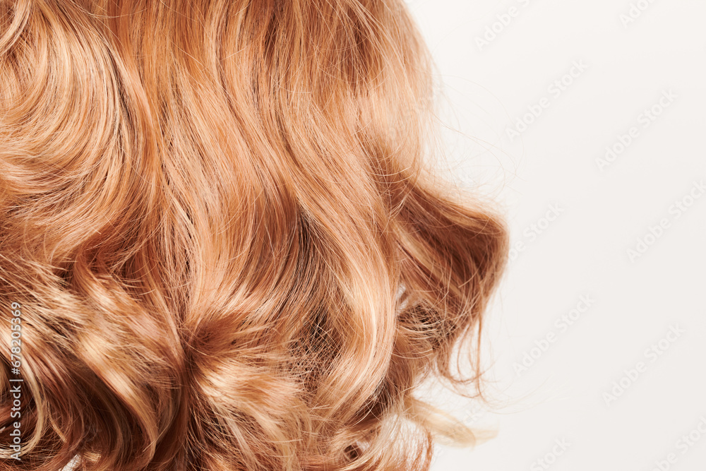 Natural looking shiny hair, brown curls isolated on white background with copy space Natural looking shiny hair, brown curls isolated on white background with copy space