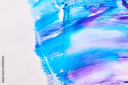 Acrylic multicolor paint blot, chaotic brushstroke, spot flowing on white paper background. Creative blue color backdrop, fluid art.