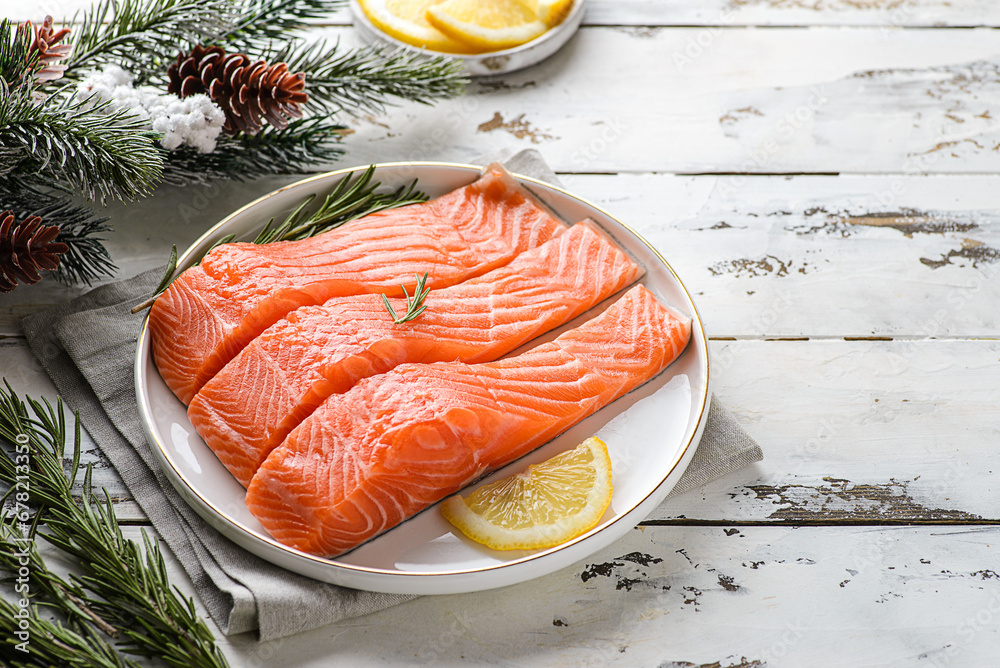 raw salmon fillet in a Christmas composition - obrazy, fototapety, plakaty 