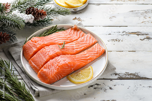 Fototapete raw salmon fillet in a Christmas composition