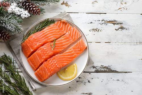 raw salmon fillet in a Christmas composition photo