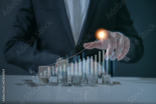 businessman typing and using on laptop holographic in the office workplace planing in work progress about investment and money management ,trading chart  financial investment money management concept 