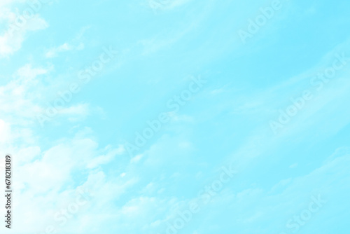Blue pastel sky with white fluffy cloud. Cumulus clouds background. Cloudscape morning sky. The concepts of freedom of live, never give up and positive though energy.
