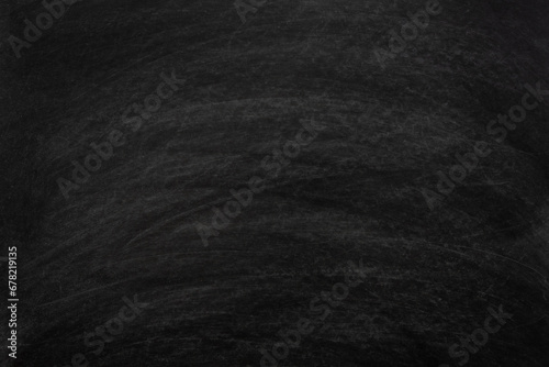 Working place on empty rubbed out on blackboard chalkboard texture background for classroom or wallpaper, add text message. photo