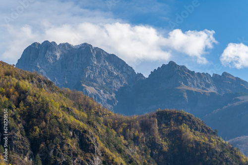 blue sky over valley among albania theth national park and mountains