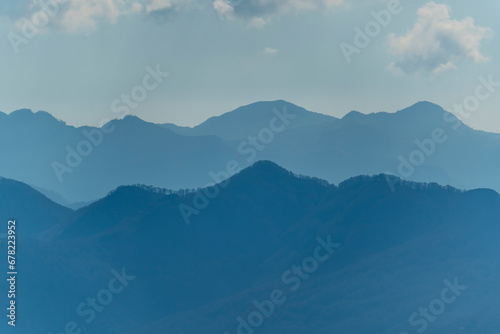 blue sky over valley among albania theth national park and mountains photo