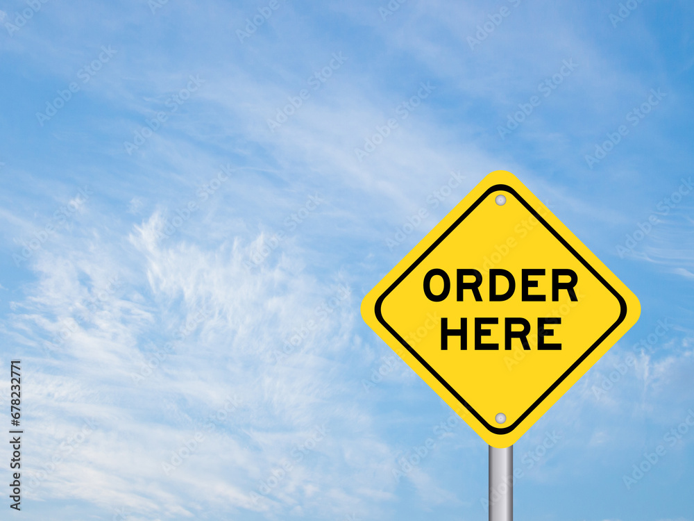 Yellow transportation sign with word order here on blue color sky background Yellow transportation sign with word order here on blue color sky background