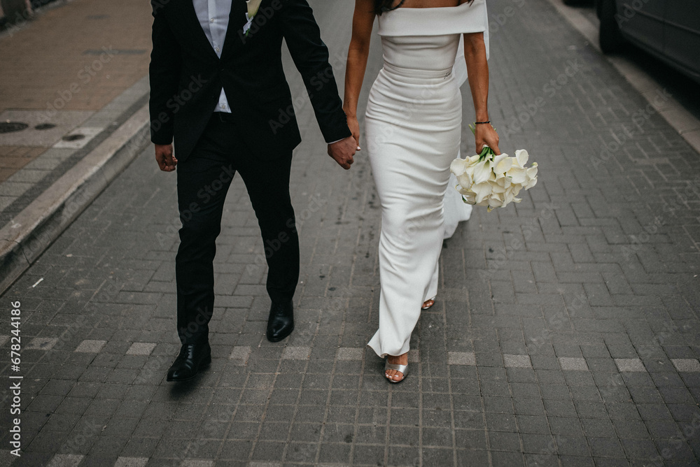 Bride and groom. Just married. Happy couple just walking. Bride and groom. Just married. Happy couple just walking.