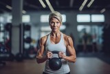 Photography in the style of pensive portraiture of a fitness mature woman doing kettlebell exercises in a gym. With generative AI technology