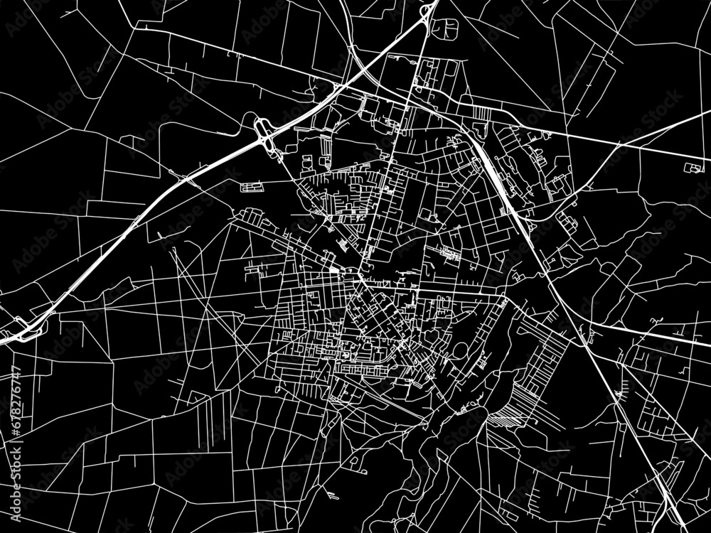 Vector road map of the city of Tomaszow Mazowiecki in Poland with white roads on a black background.