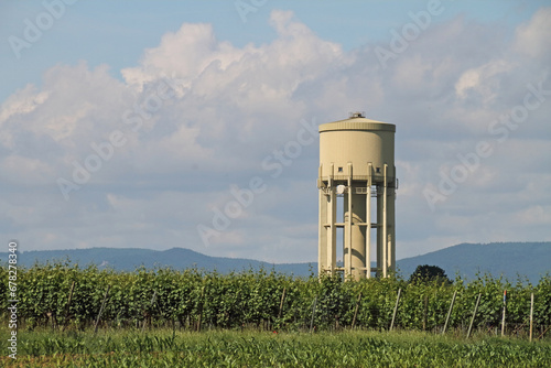 Water tower with the Palatinate Mountains in the background