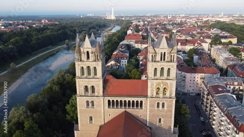 St. Maximilian church top view next to the Isar river in Munich photo