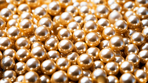 Beautiful golden pearls as a background, close-up