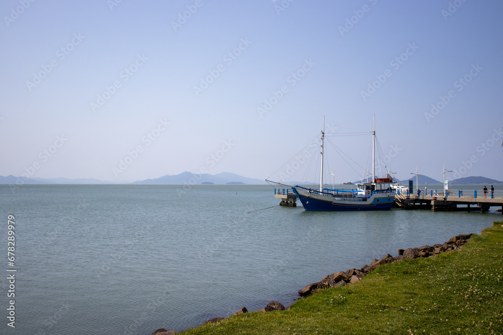 Beautiful landscape with boat on the pier in Florianópolis Santa Catarina Brazil Beautiful landscape with boat on the pier in Florianópolis Santa Catarina Brazil