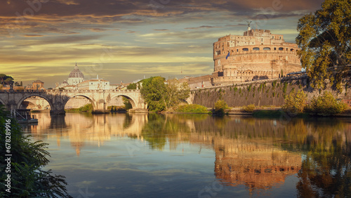 Castel Sant'Angelo and bridge with reflections on the Tiber river in Rome, Italy.