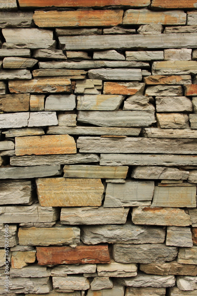 Fototapeta premium Multi colored dry stone wall in Ghandruk, Nepal.