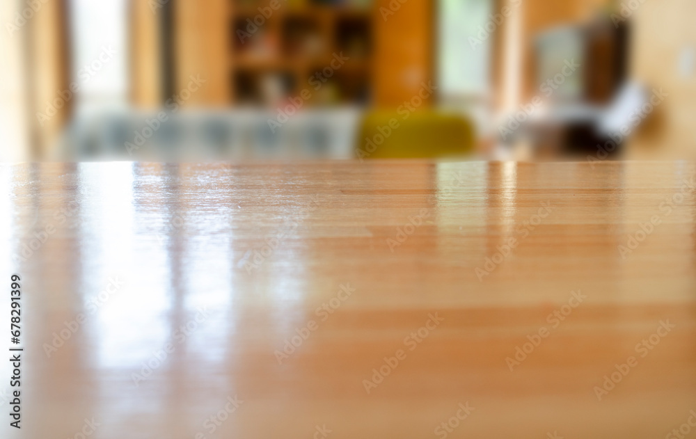 wooden table with base to fill with objects with the background of a house out of focus wooden table with base to fill with objects with the background of a house out of focus
