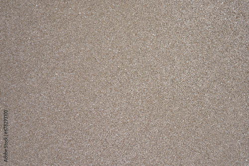Texture of clean beach wet sand
