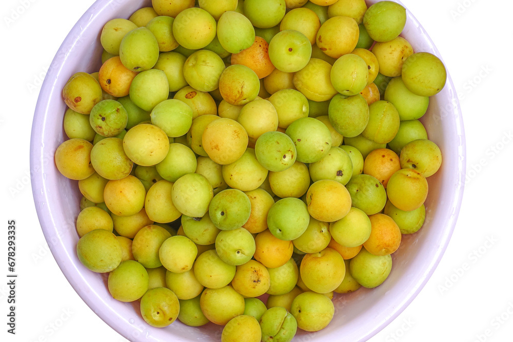 Fresh yellow plums, light green plums background. Fresh yellow plums, light green plums background.