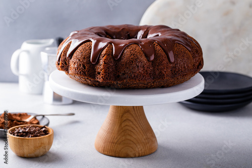 Chocolate bundt cake with chocolate ganache icing photo