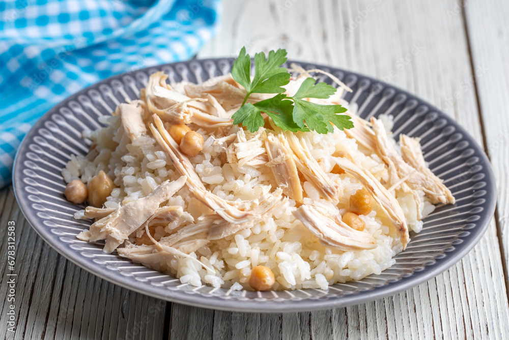 Traditional delicious Turkish food; Rice with chickpeas and chicken (Turkish name; Tavuklu nohutlu pilav or pilaf) Traditional delicious Turkish food; Rice with chickpeas and chicken (Turkish name; Tavuklu nohutlu pilav or pilaf)