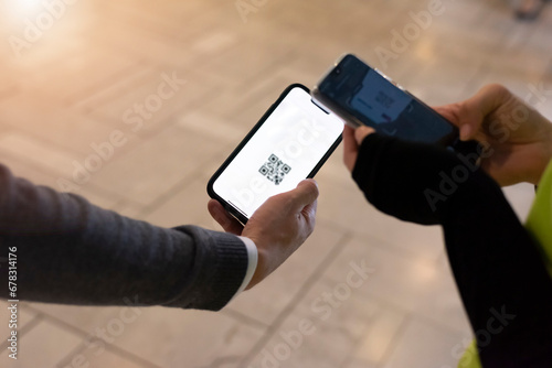 Event QR code ticket scanning. Businessman registering for a business conference using his smart phone