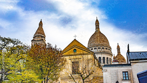 Paris downtown in the Montmartre area and sacre coeur church photo