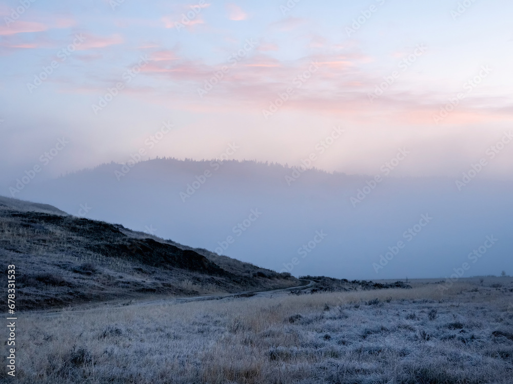 Dawn path. Mountain off-road track to high mountain village in Altai region.