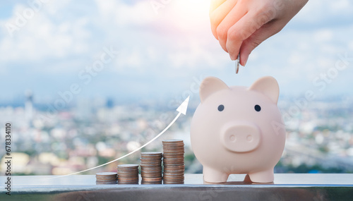 business finance and saving money investment , Money coin stack growing graph with piggy bank saving concept. Balance savings and investment.