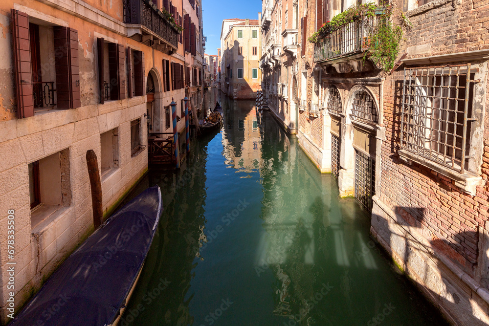 Venice. Old stone traditional houses over the canal.