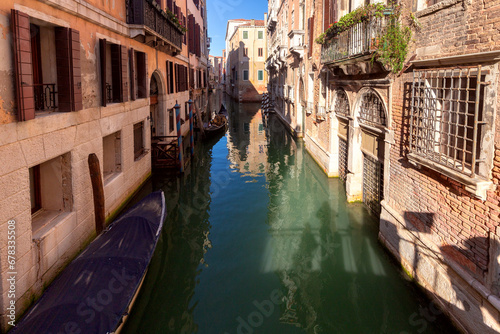 Venice. Old stone traditional houses over the canal. © pillerss