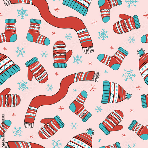 Knitwear pattern. Winter hat, scarf, mittens and socks with ornament,  accessories, warm clothes. Vector seamless background. Knitting, handmade. Bright illustration , doodle style.