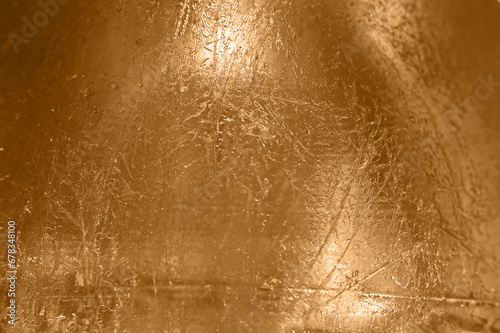 Gold polished metal background surface and golden backdrop.