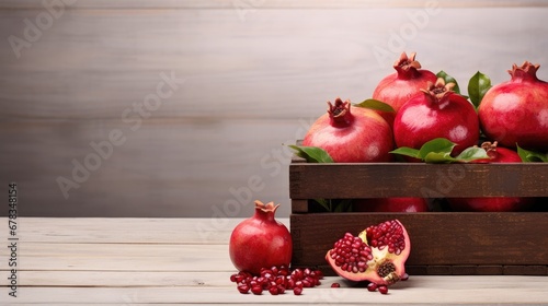 Culinary elegance! pomegranate fruits arranged in a wooden box on a pristine white background