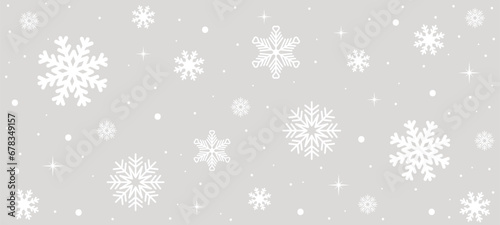 Gray background with white snowflakes and stars.