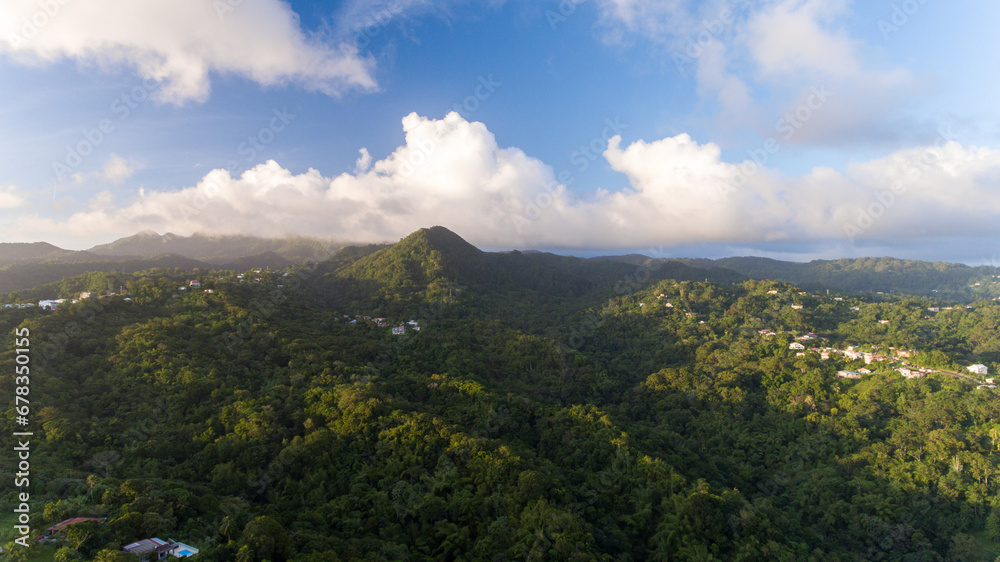 Obraz premium Dusk descends on a Martinique mountain town.