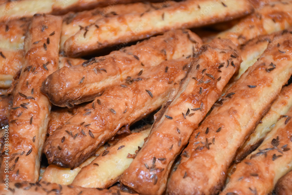 Homemade salty crackers sticks with cheese and cumin, cheese sticks Homemade salty crackers sticks with cheese and cumin, cheese sticks