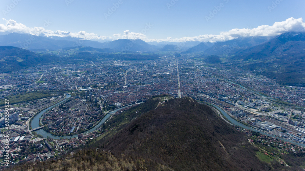 Large aerial shot over Grenoble sunny day