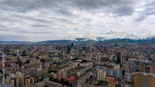 Ulaanbaatar's urban sprawl beneath cloudy skies