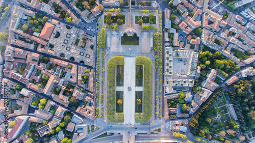 Montpellier s urban park basks in the evening sun.