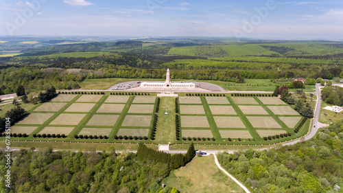 Verdun's Douaumont Ossuary amidst soldier graves