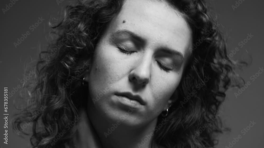 Person experiencing stiff neck, woman having body pain in black and white Person experiencing stiff neck, woman having body pain in black and white